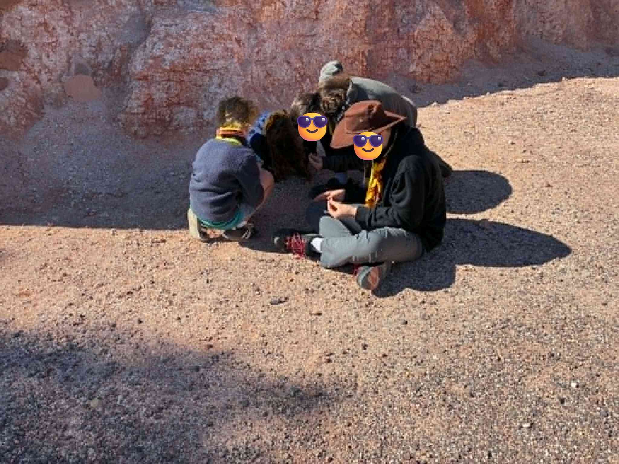 Scouts prospecting for opals in a gravel car park at Coober Pedy